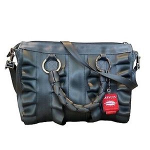 Mint condition. Fun and very durable purse.